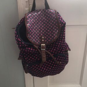 Pink Polka dotted navy backpack